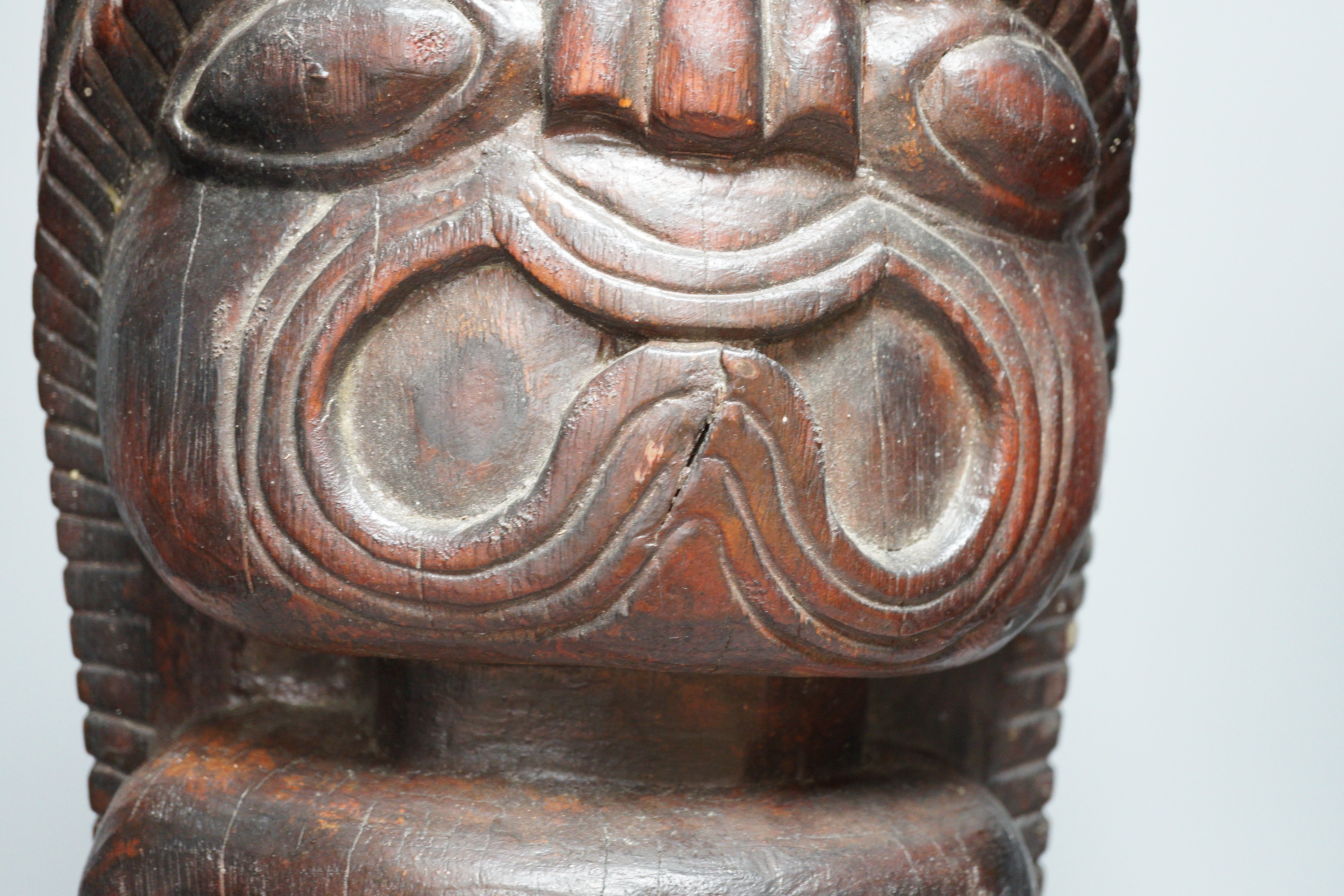 A tribal figural carving, 50cm